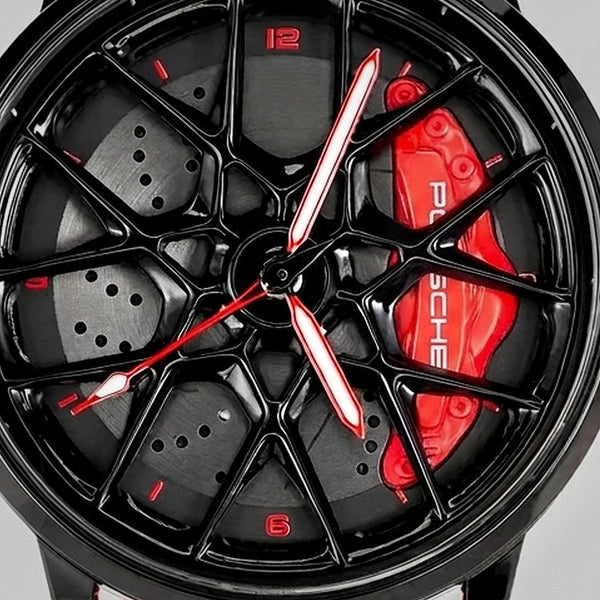 Primer plano de la llanta y de la pinza grabada PORSCHE, reloj Porsche 718