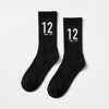 Calcetines Ayrton Senna 12, temporada 1988 negro, el par en plano