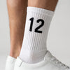 Calcetines Kimi Antonelli 12 blanco, primer plano del motivo tejido