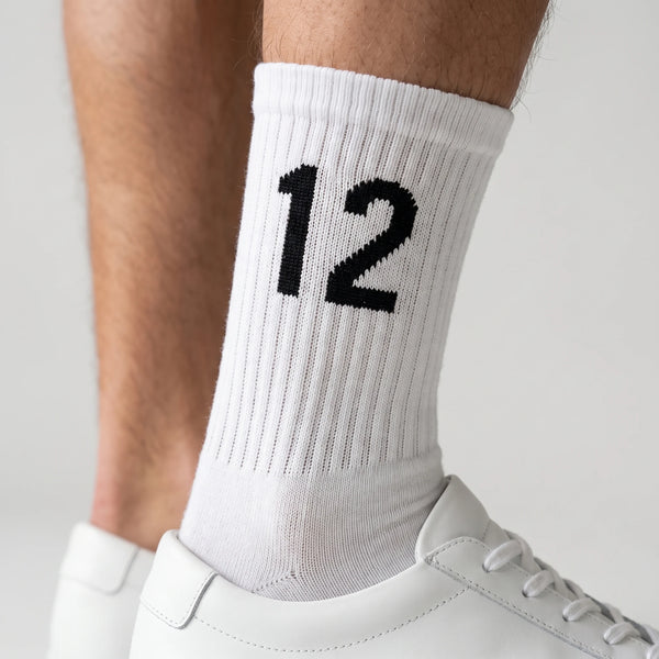 Calcetines Kimi Antonelli 12 blanco, primer plano del motivo tejido