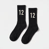 Calcetines Kimi Antonelli 12 negro, el par en plano