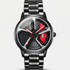 Reloj Audi RS 6, esfera llanta, pinza roja, vista frontal