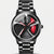 Reloj Audi RS 6, esfera llanta, pinza roja, vista frontal