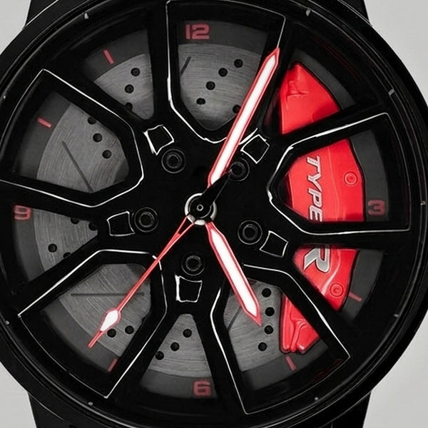 Primer plano de la llanta y de la pinza grabada TYPE R, reloj Honda Type R